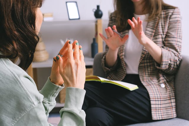 woman talking to therapist