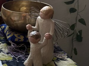 Angel guiding little child